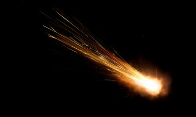 texture of a falling comet with sparks, smoke and a trail of particles, isolated on a black background - 481885252