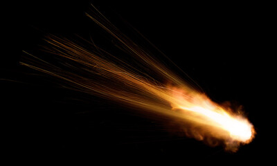 texture of a falling comet with sparks, smoke and a trail of particles, isolated on a black background - 481885253