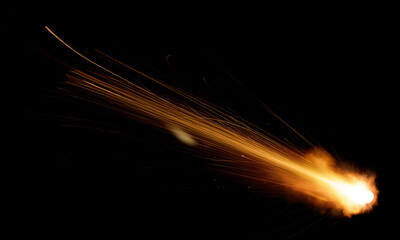 texture of a falling comet with sparks, smoke and a trail of particles, isolated on a black background - 481885255