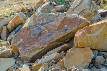 Pile of natural stone for background texture. Stone mining.