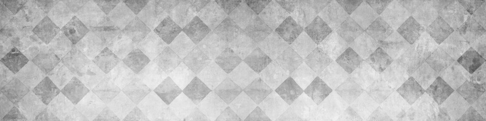 Old gray grey worn vintage shabby patchwork mosaic tiles wallpaper stone concrete cement wall texture background banner, with rhombus diamond rue lozenge square print..