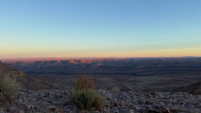 Fish River Canyon in Namibia. Grand Canyon in USA. Sunset time lapse.