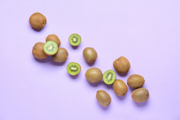 Fresh ripe kiwi on purple background