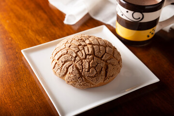 Conchas. Mexican sweet bread roll with seashell-like appearance, Usually eaten with coffee or hot chocolate at breakfast or as an afternoon snack.