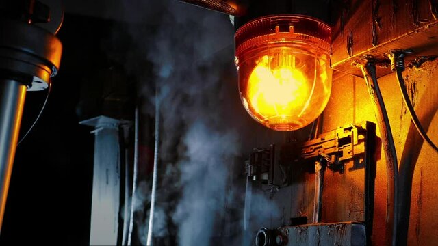 Machinery Releasing Steam With Flashing Light