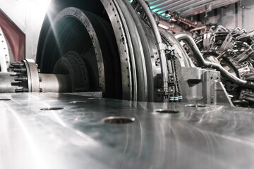 The rotor of a gas turbine compressor with a bolted coupling half