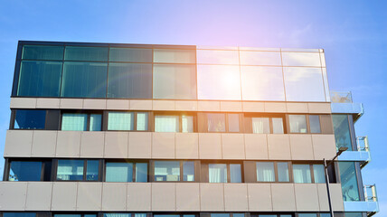 Facade of a modern apartment condominium in a sunny day