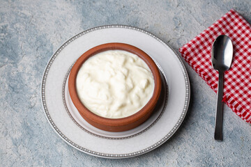 Homemade yogurt in a rustic bowl
