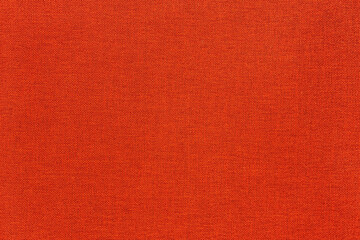 abstract background of red woolen furniture upholstery close up
