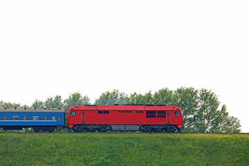 passenger train leaves the city and picks up speed	
