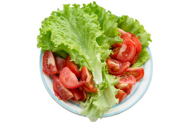 plate with frillis salad, lettuce and tomatoes on a white background top view isolated on white