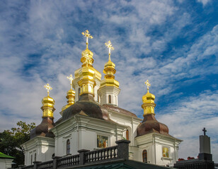 Fototapeta na wymiar Golden cupolas of Church of the Nativity of the Blessed Virgin in Kyiv Pechersk Lavra monastery, Kyiv, Ukraine