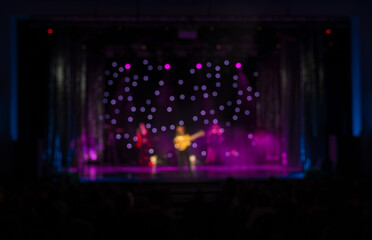 Plakat Texture blur and defocus, background for design. Stage light at a concert show. Artists perform on scene in light and smoke.