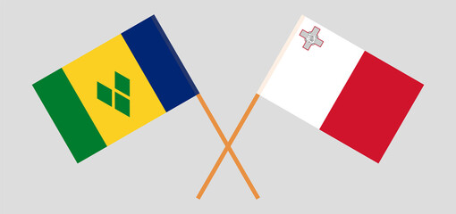 Crossed flags of Saint Vincent and the Grenadines and Malta. Official colors. Correct proportion