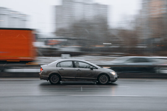 Ukraine, Kyiv - 15 January 2022: Brown Honda Civic car moving on the street. Editorial