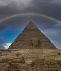 A rainbow over the Great Sphinx and Pyramids of Giza, near Cairo in Egypt
