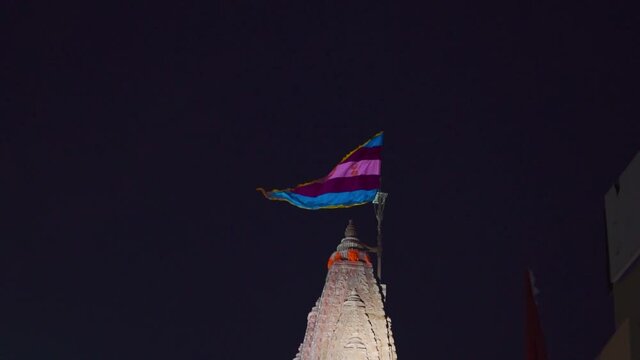 Night view of beautiful Dwarka temple with flag on top At Dwarka, Gujarat, India. Sacred pilgrimage of Hindus in India
