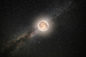 Bright milky way galaxy and full moon. Night starry sky background.