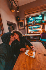 Cute Couple Kissing in Bakery with Pastry