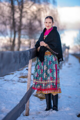 Young beautiful slovak woman in traditional dress. Slovak folklore