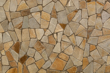 Masonry of brown stone. Background, texture