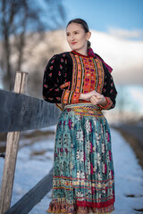 Young beautiful slovak woman in traditional dress. Slovak folklore