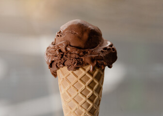 close up of chocolate ice cream cone 