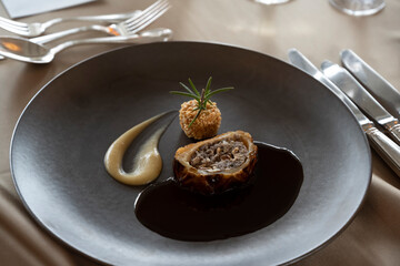 Cooking on a black plate