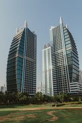 Obraz premium Public park area landscape with futuristic modern skyscrapers view 