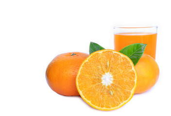 Close up of fresh orange slices and fresh orange juice on white background. 
