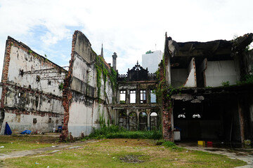 Lost Places. View of an old abandoned facade, remains of a collapsed house built around the turn of...