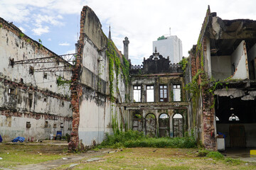 Lost Places. View of an old abandoned facade, remains of a collapsed house built around the turn of...