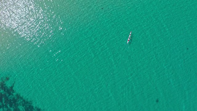 Australian summer watersport activity sea Kayaking in blue coastal water