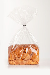 Bread toast in plastic bag isolated on white background.