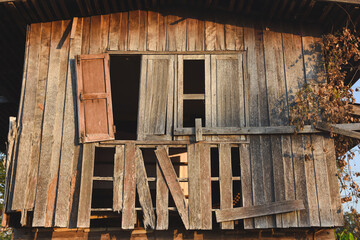 Naklejka premium Old wooden house walls decay over time.