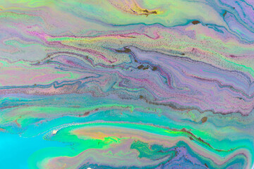 Streams of liquid purple and green inks background. Waves of fluid vivid fluid paint.