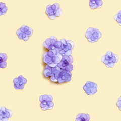Natural Hydrangea violet flower, minimal floral pattern on beige background colored. Layout with fresh flowers. Spring holiday concept, for Mothers day, 8 March, Womens day. Flat lay