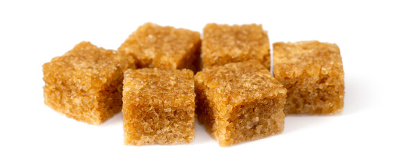 Brown sugar cubes isolated on white background