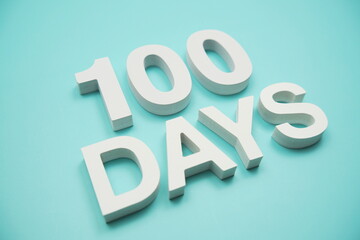 100 Days alphabet letters on blue background
