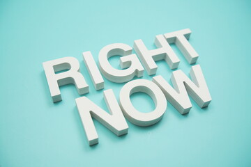 Right Now alphabet letters on blue background