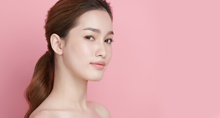 Beautiful young asian woman with clean fresh skin on pink background, Face care, Facial treatment, Cosmetology, beauty and spa, Asian women portrait.