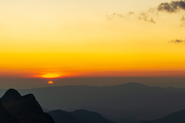 Sunset or evening time with clouds at mountain hill valley Doi Luang Chiang Dao, Chaingmai, Thailand. Asia.