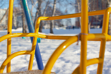 Swing on winter background.