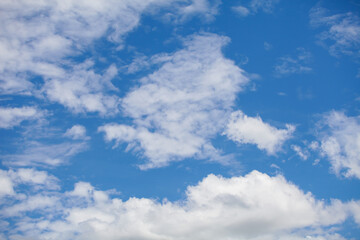Naklejka na ściany i meble Blue sky with cloud background.