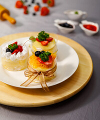 Crepe cake delicious decorated with fresh fruite on a white plate, , for birthday, Valentine day and celebration