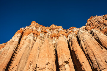 Scenery with red rock cliffs, and stone desert near Mojave, California in the west of the U.S. 