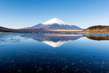 Fototapeta na wymiar Fuji mountain reflection in winter at Yamanakako Lake, Japan