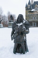 Iron warrior statue in winter in russia 