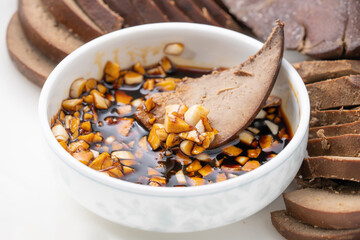 Fresh braised pork liver in monochrome background color