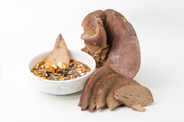 Fresh braised pork liver in monochrome background color